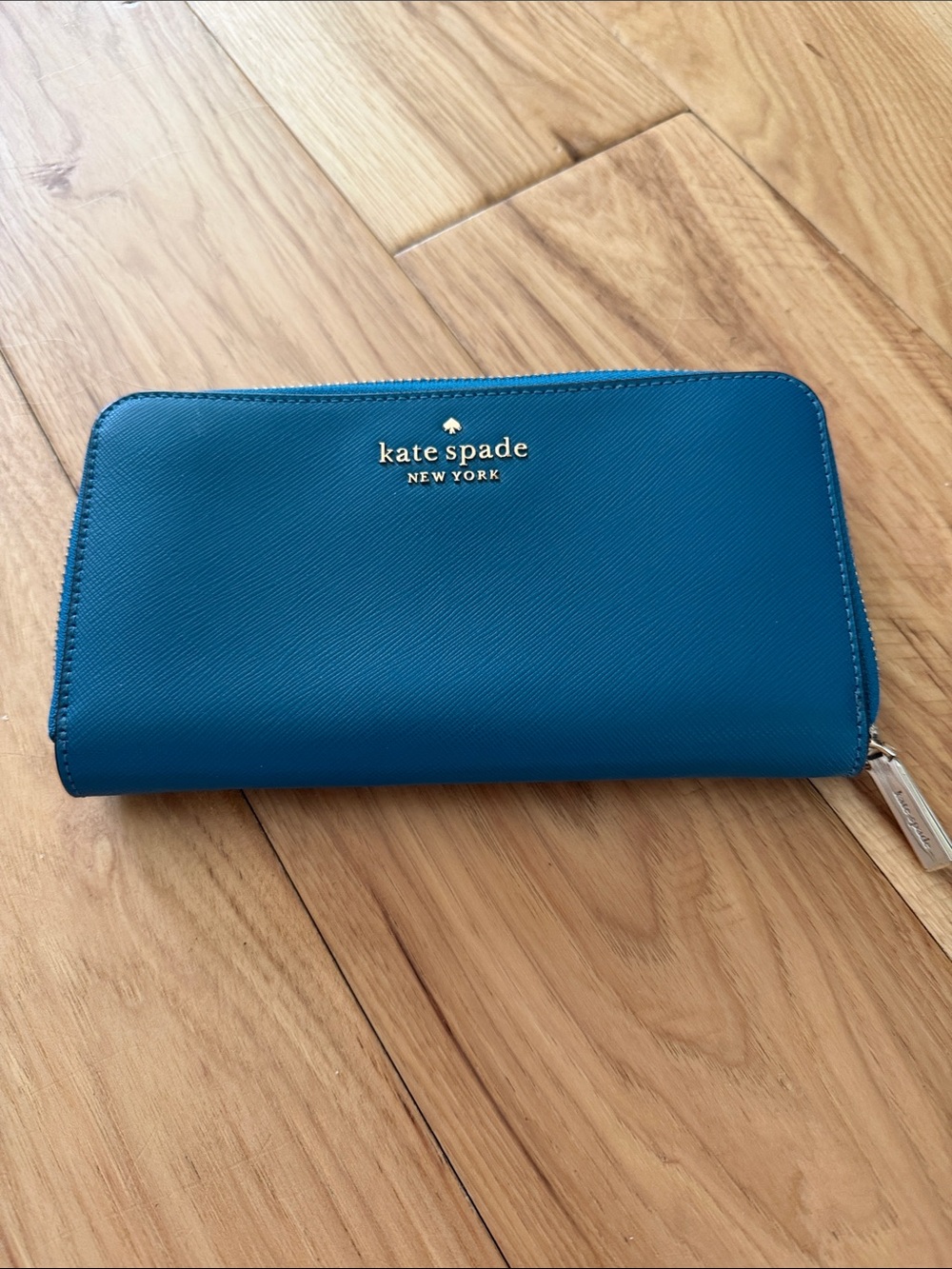 kate spade Blue Zip-Around Saffiano Wallet with Gold Logo